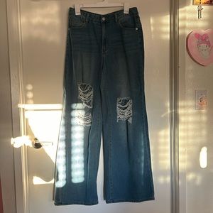 Baggy jeans with rips on knees